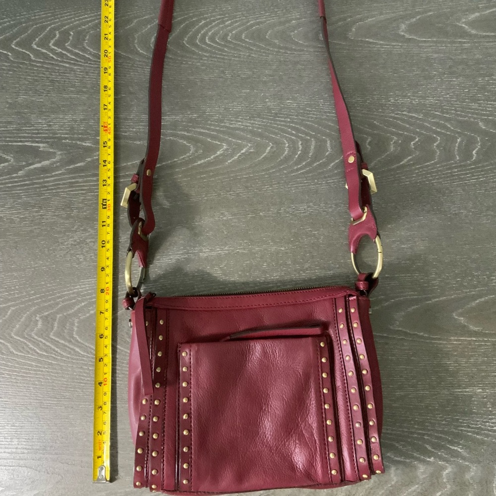 orYany Maroon Pebbled Leather Studded Crossbody - Picture 9 of 12